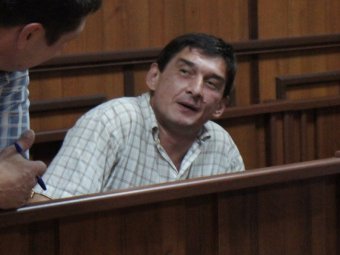 По словам адвоката, обвиняемый Олег Гутиев обещал переломать ему ноги