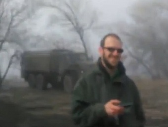 ТАСС открестилось от смеющегося над обстрелом в Дебальцево фотографа