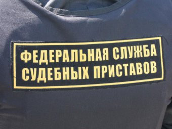 Приставы внесли в список должников главного саратовского мусорщика Путина