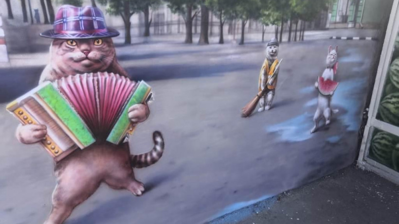 Саратовский художник завершил граффити с котами в центре города