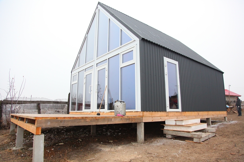 Целью проекта современного «Нового дома»  было вписать в архитектуру села